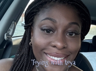 Toying_with_toya
